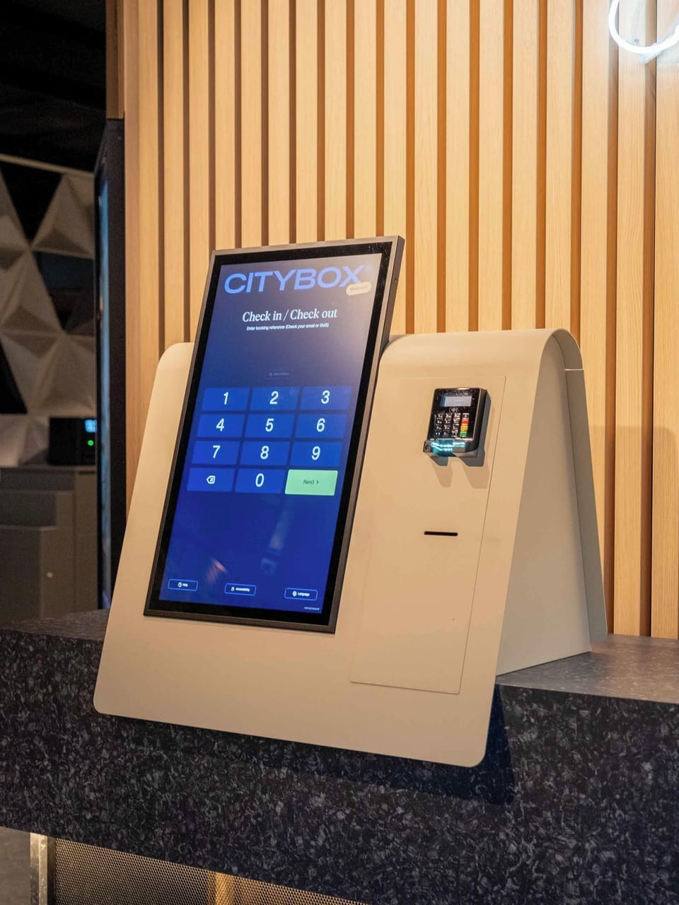 Check-in/check-out kiosk