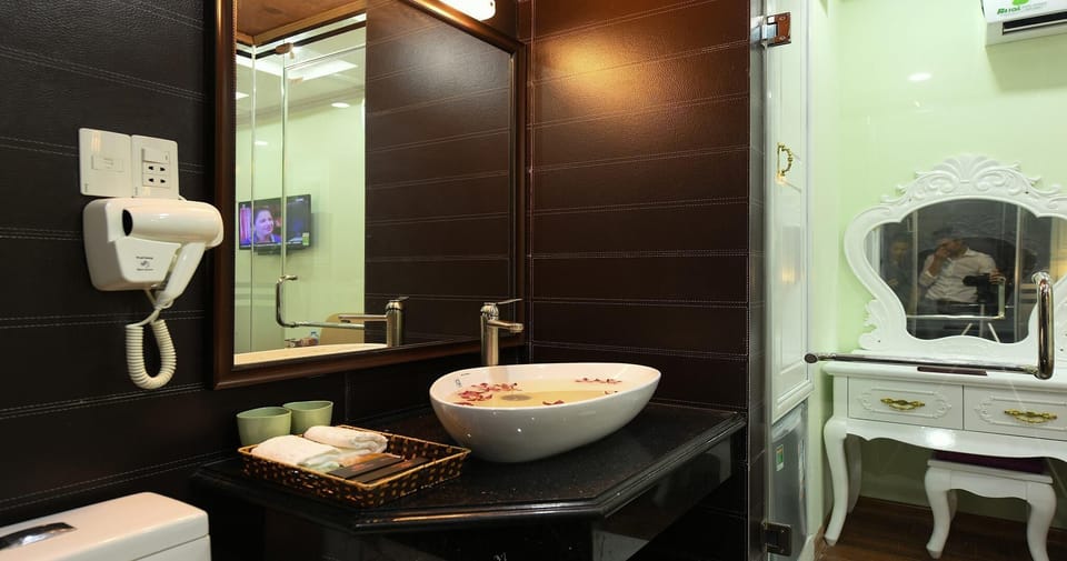 Shower, rainfall showerhead, eco-friendly toiletries, hair dryer