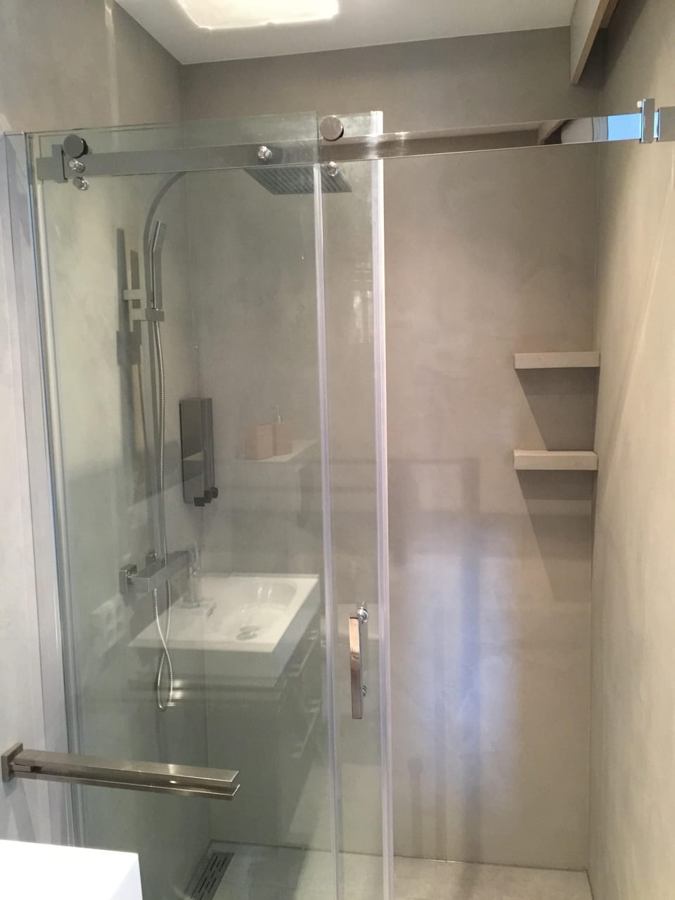 Walk-in shower with soap dispensers