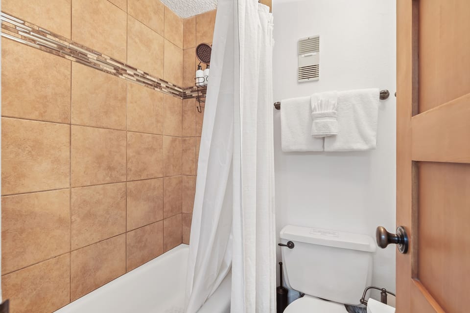 Master bathroom with separate bathtub/toilet.