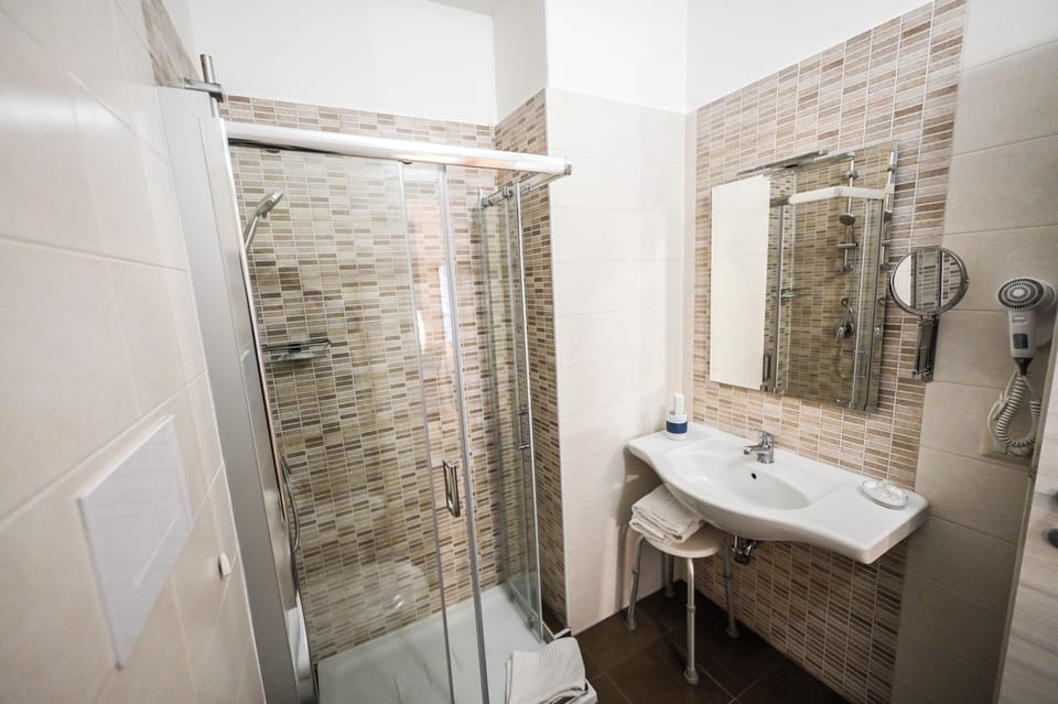 Triple Room, Multiple Beds | Bathroom | Shower, bidet, towels