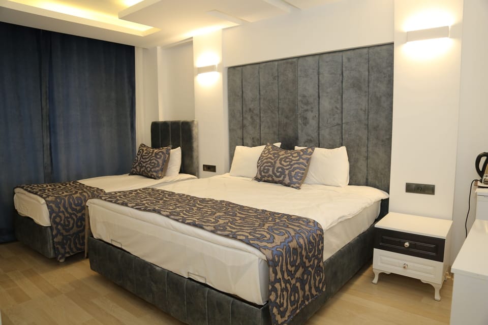 Premium bedding, minibar (some free items), desk, laptop workspace