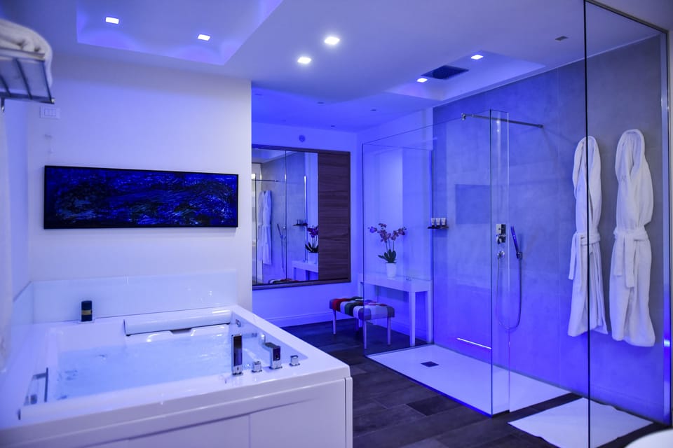Deluxe Apartment, 1 Bedroom, 2 Bathrooms | Bathroom | Hair dryer, bathrobes, slippers, bidet