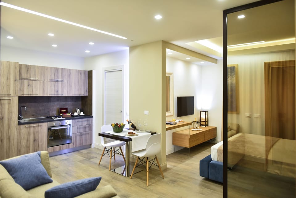 Junior Studio Suite, Kitchenette | Premium bedding, in-room safe, individually decorated