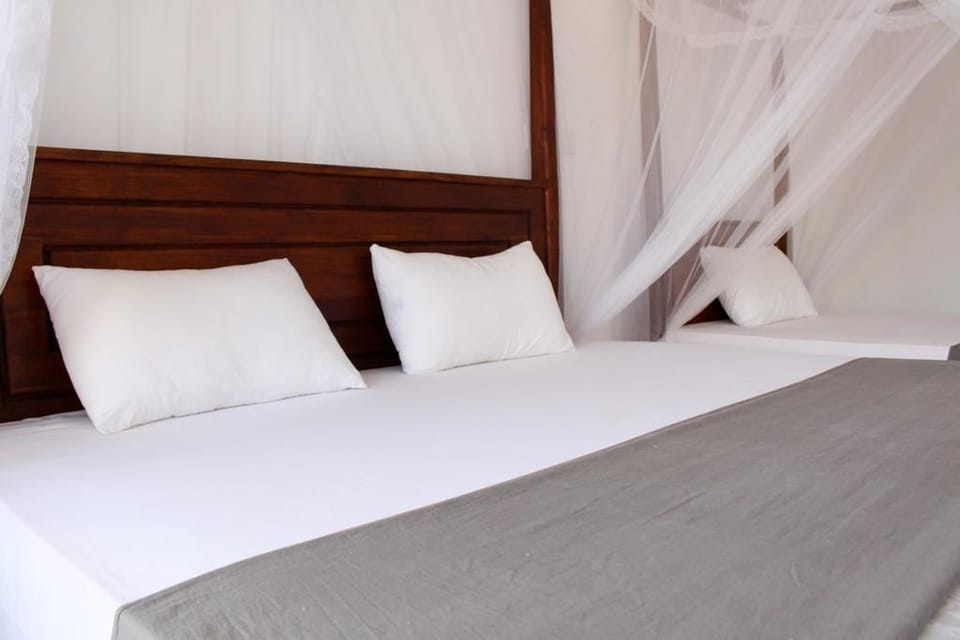 Double Room, Resort View | Desk, iron/ironing board (on request), WiFi (free), bed sheets