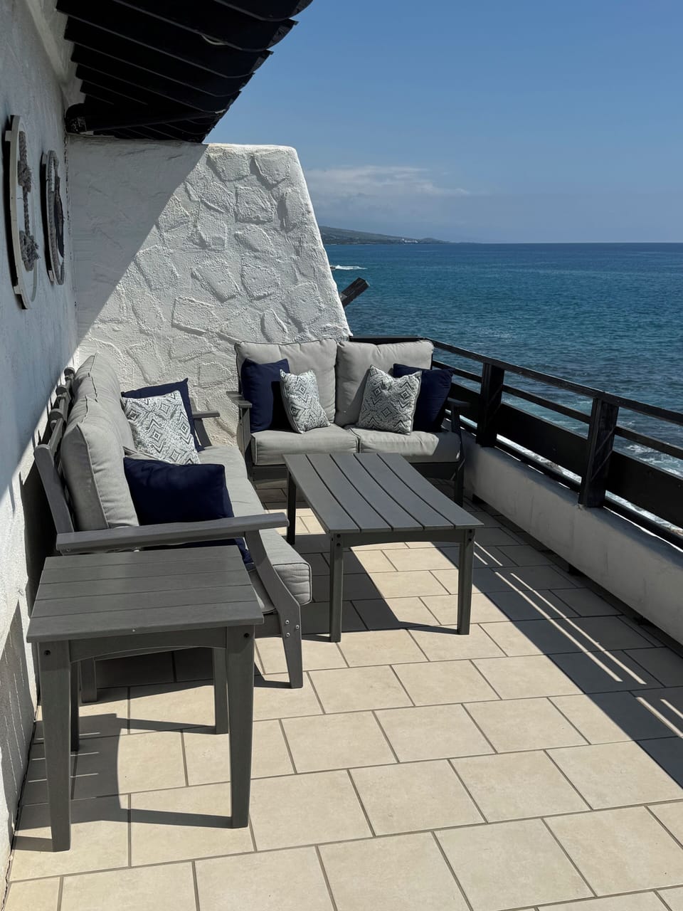 Sunny side of lanai with sunset and ocean views!