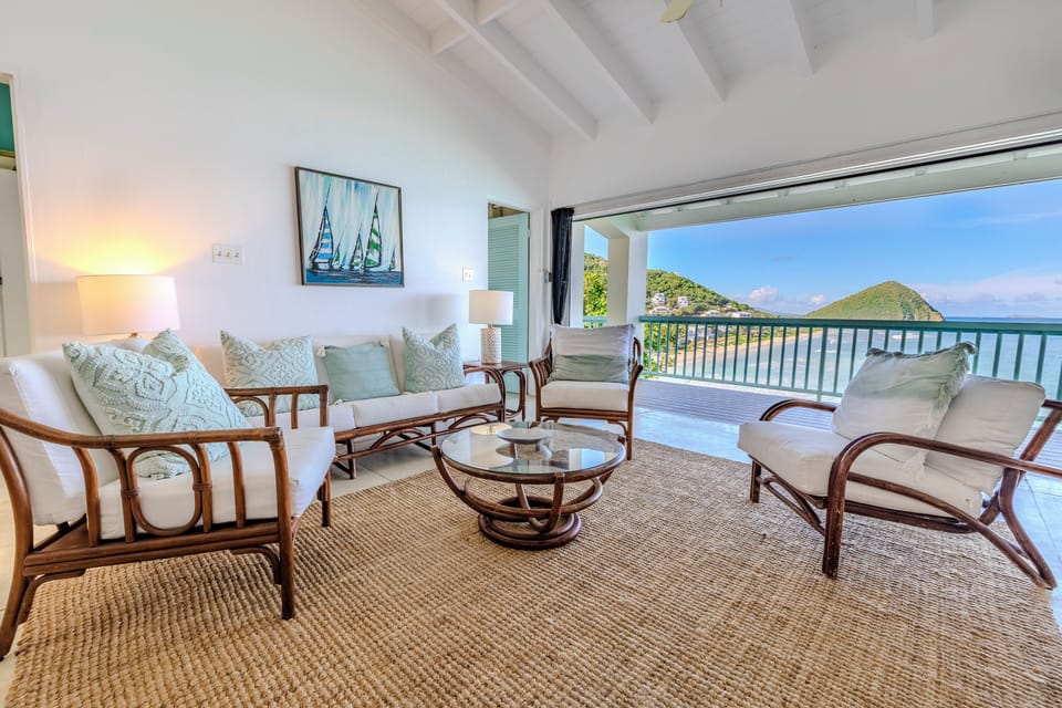 Living room. View of Long Bay 