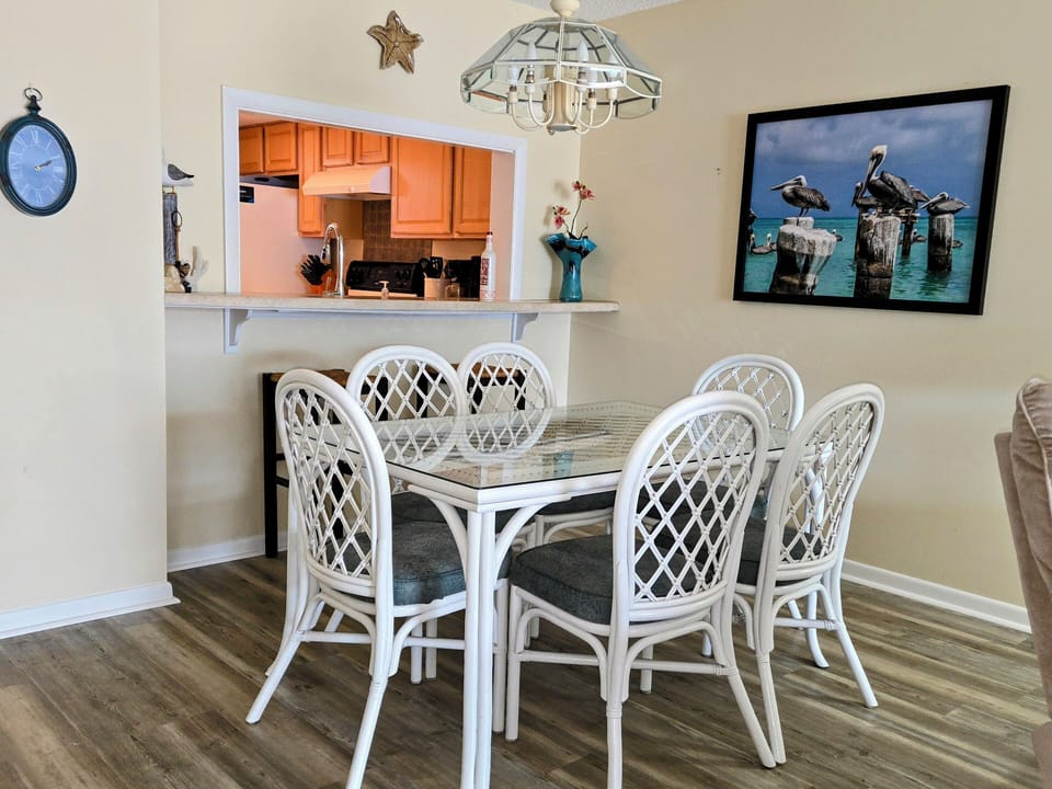 Dining table for 6 with kitchen in background