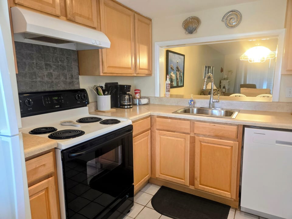 Kitchen stove, sink and passthrough to dining room