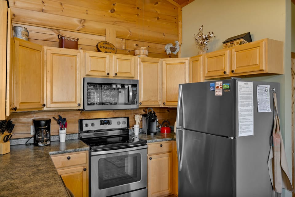 Fully stocked kitchen with new stainless steel appliances, Keurig and Mr. Coffee