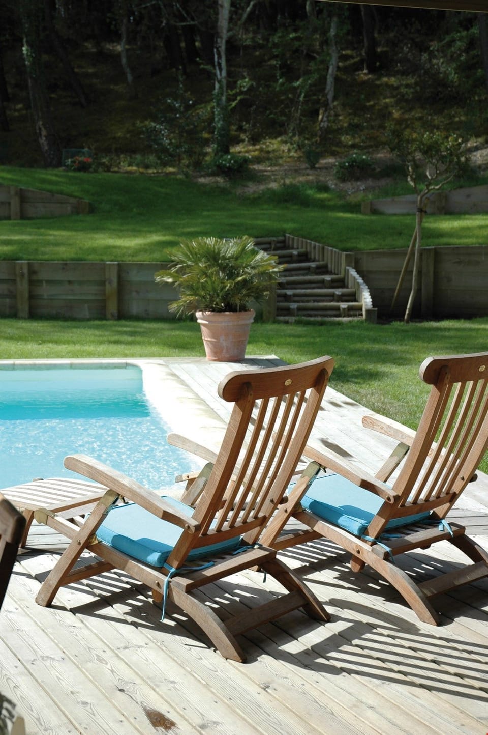 Lounge by the pool in the sunshine.