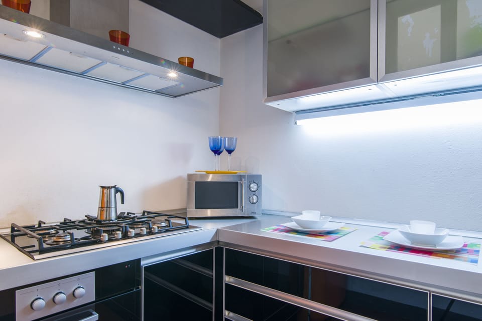 Duplex, 2 Bedrooms | Private kitchen | Full-size fridge, microwave, oven, stovetop