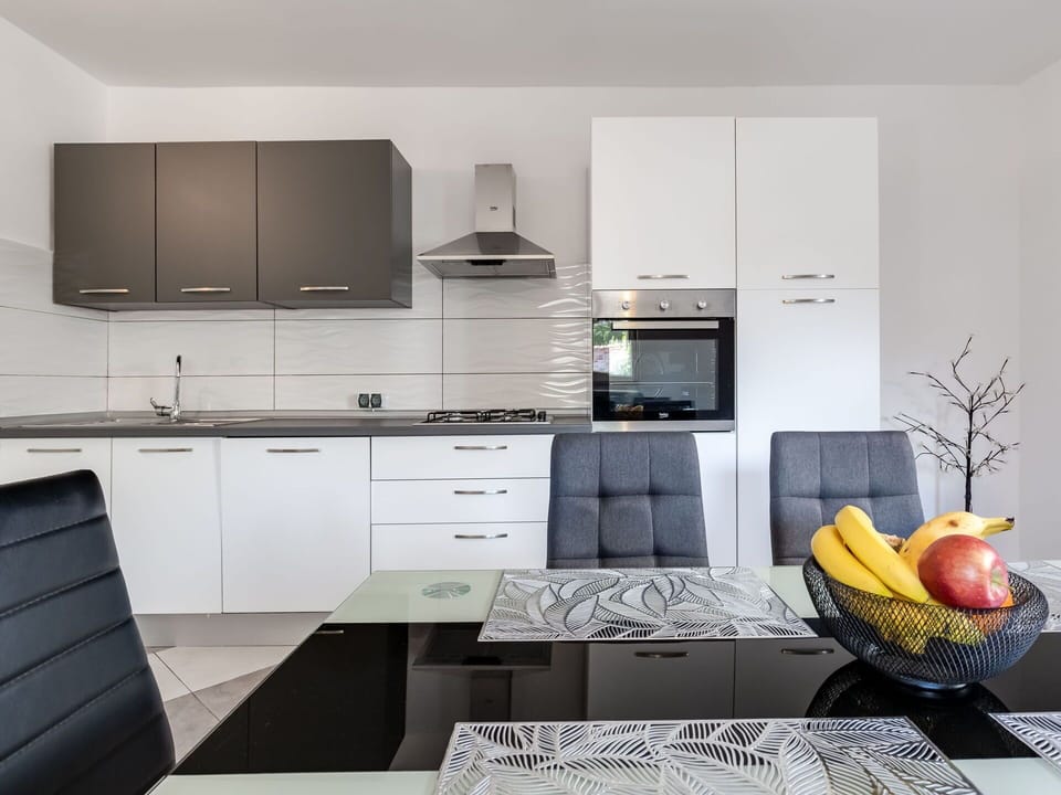 Cabinetry, Property, Countertop, Furniture, Kitchen Stove, Kitchen, Interior Design, Kitchen Appliance, Home Appliance, Building