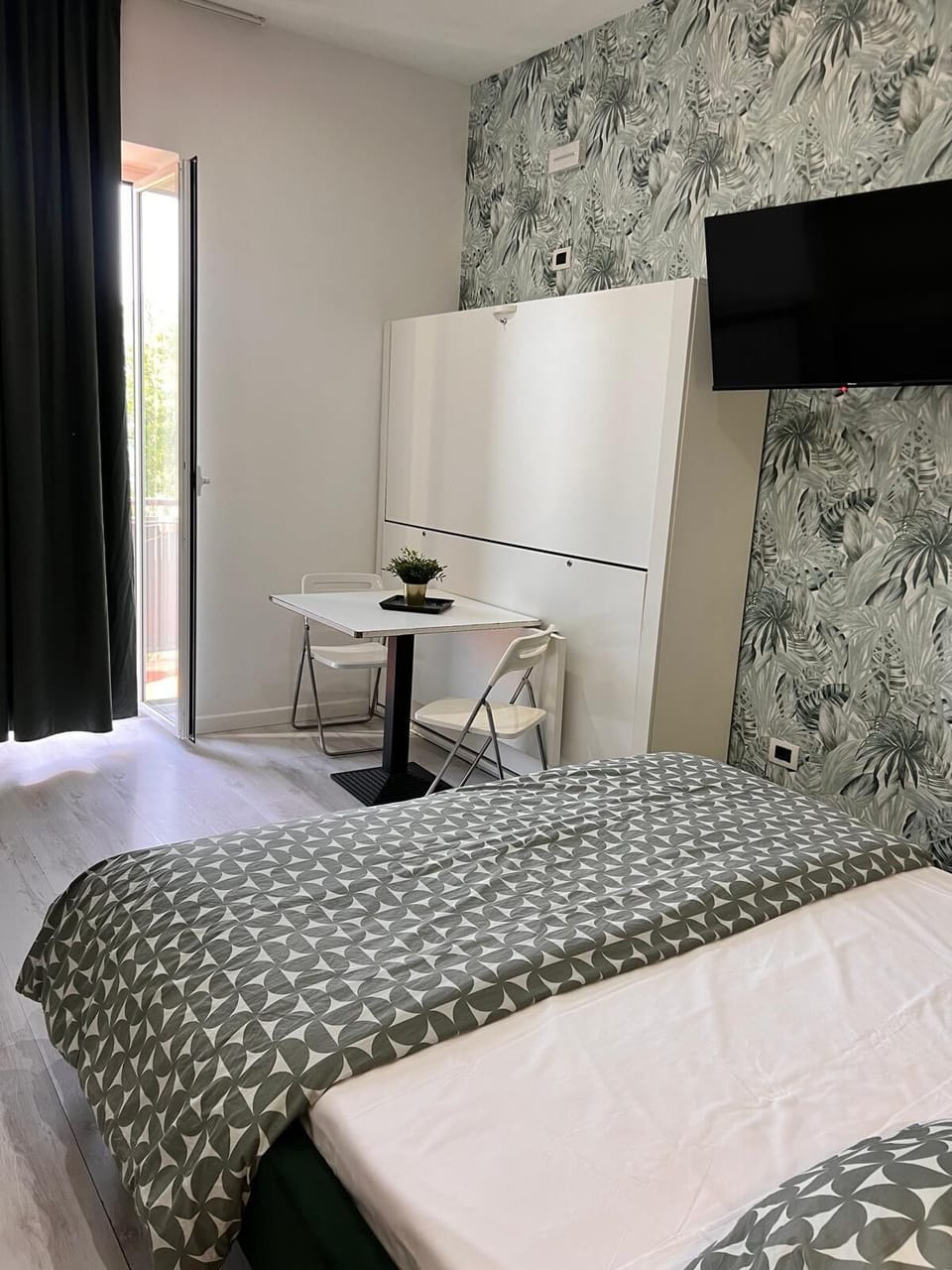 Quadruple Room, Balcony | Soundproofing, iron/ironing board (on request), WiFi (free), bed sheets