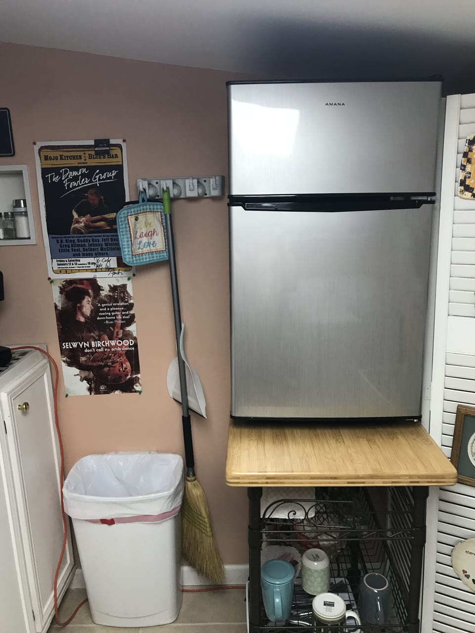 Small refrigerator in kitchenette