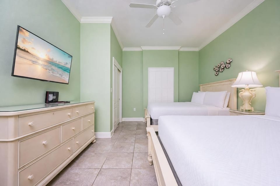 Relax in this spacious guest bedroom, enjoying soft queen bedding and a tranquil vibe