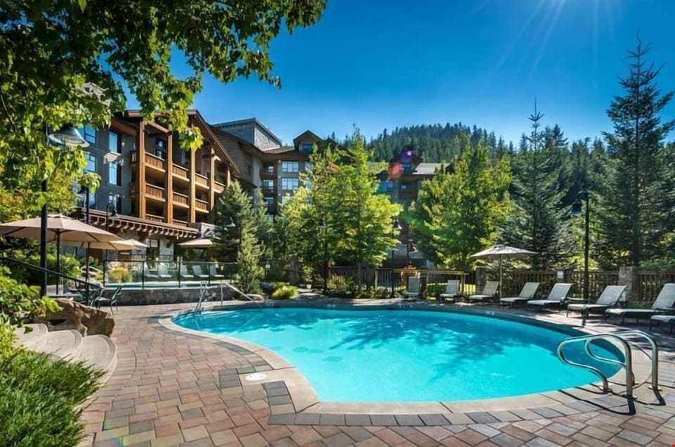 Take a dip in the luxurious outdoor pool.