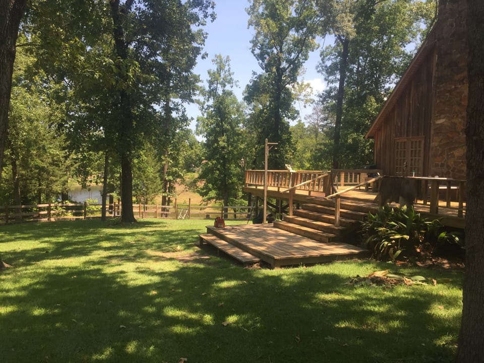 North view of lake and west side of house and deck
