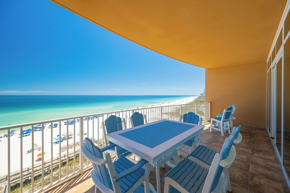 Your balcony invites peaceful mornings with a cool breeze and endless gulf views as you sip coffee