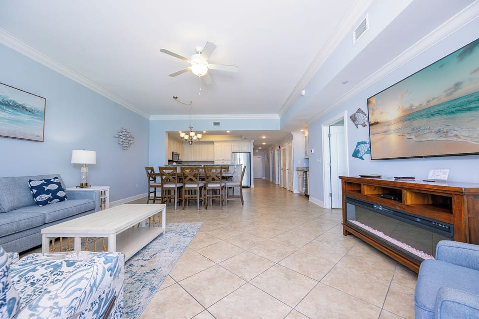 Settle into the living room sofa to watch your favorite shows while the electric fireplace adds gentle heat