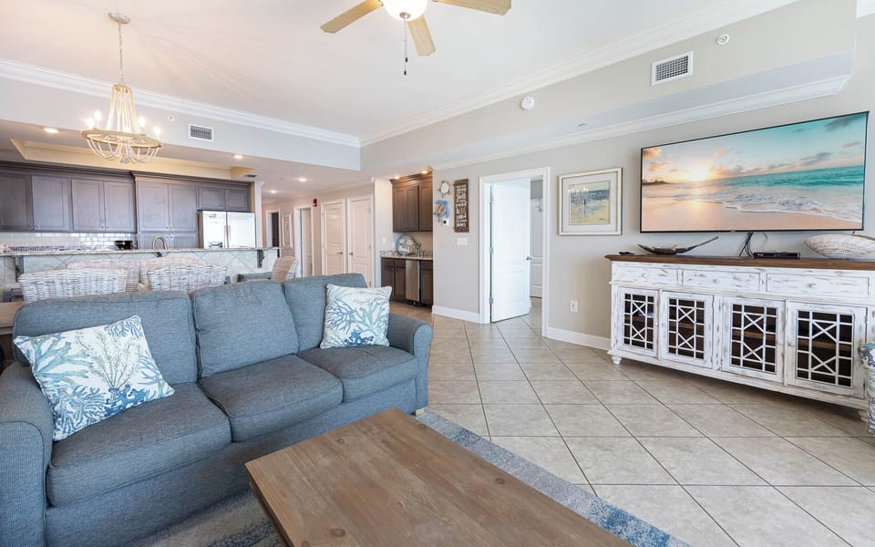 Relax on the comfortable sofa, enjoying gentle breezes and the inviting atmosphere of your beachside retreat