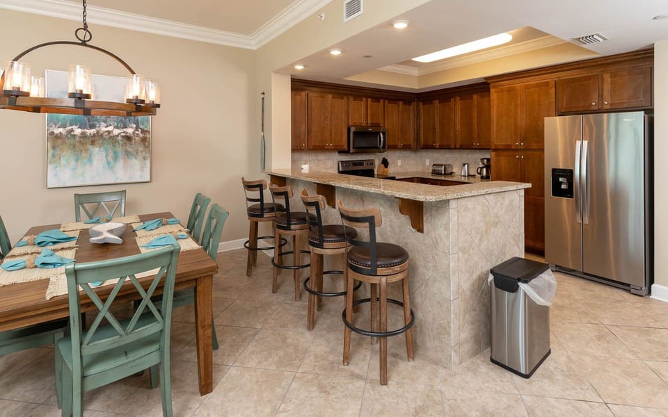 Wake up with morning coffee at the breakfast bar and get ready for a beach day in this stylish space