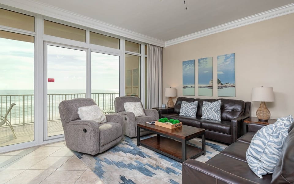 Relax on the sofa with a queen sleeper while soaking in the beach views from the balcony