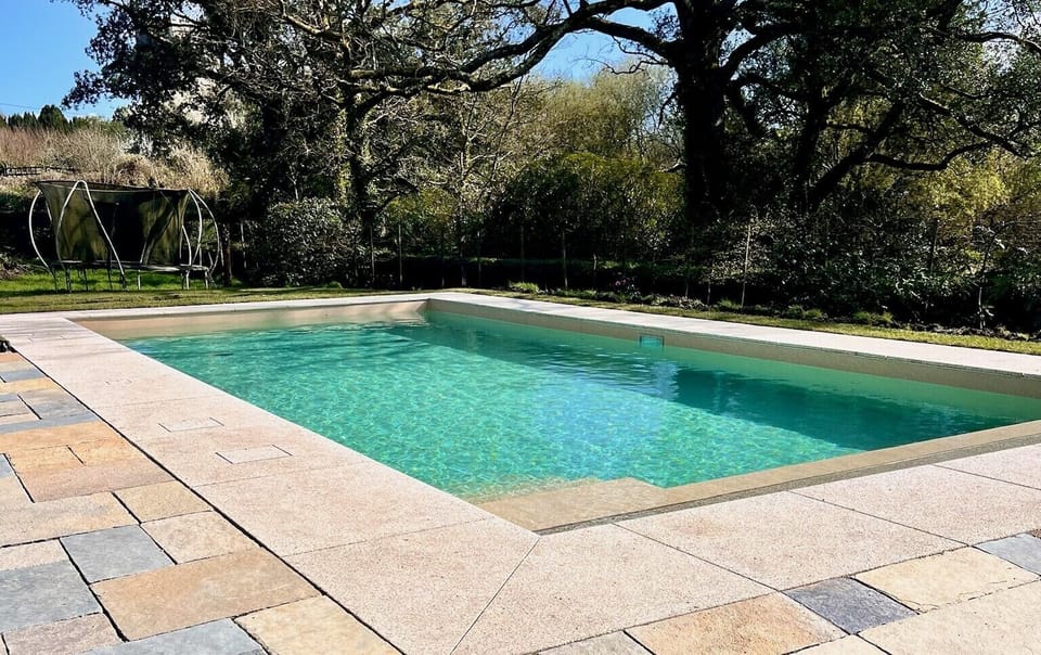 Outdoor heated swimming pool, open seasonally, sessions booked at extra cost