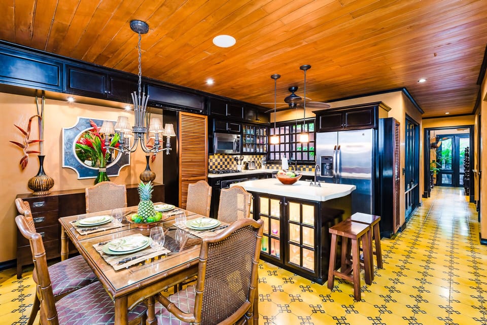 Fully equipped kitchen with gas cooktop and stainless steel appliances