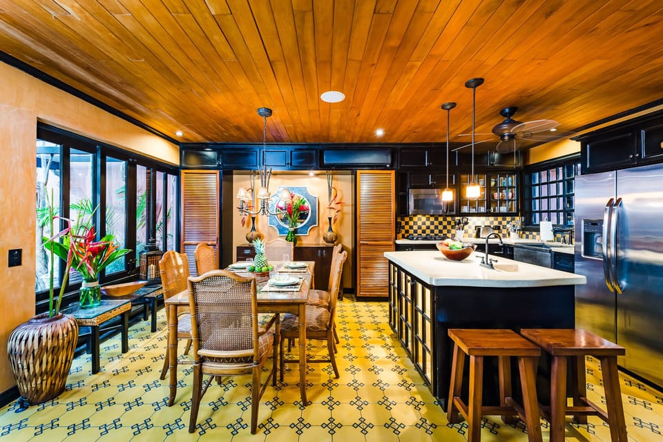 Island/wet bar separates the kitchen from dining area, perfect for entertaining