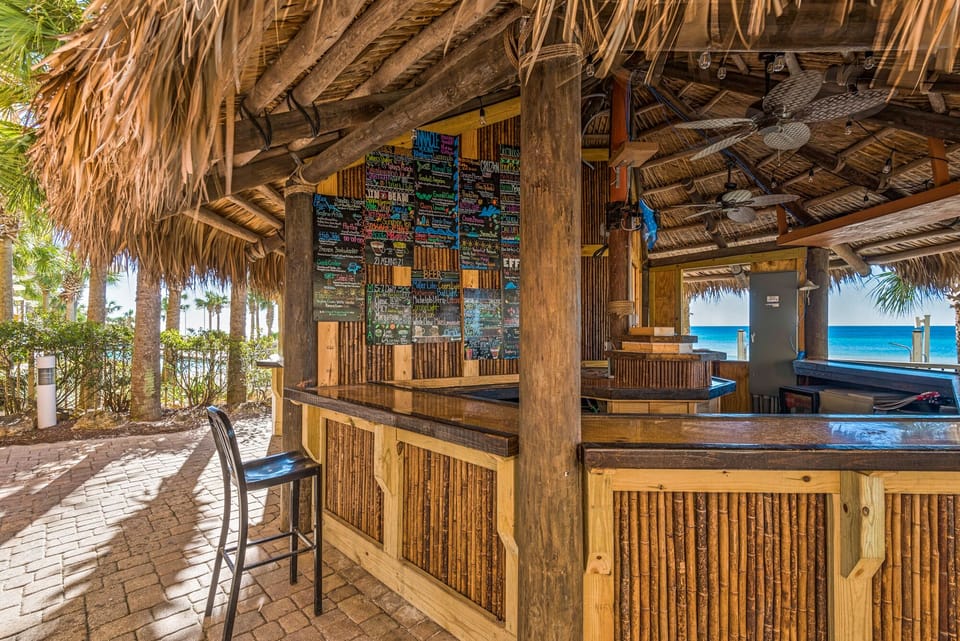 Grab that cocktail and sandwich at the Tiki Bar!