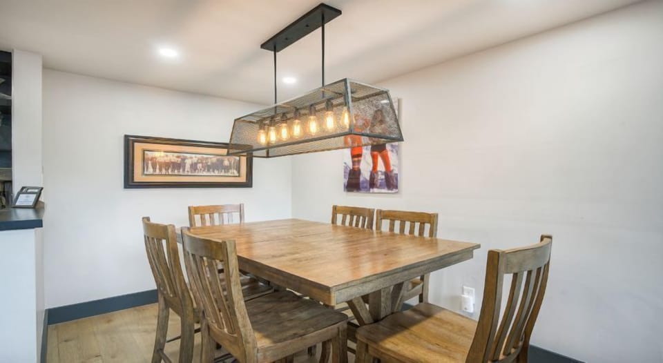 This charming wooden table is made for meals and memories.