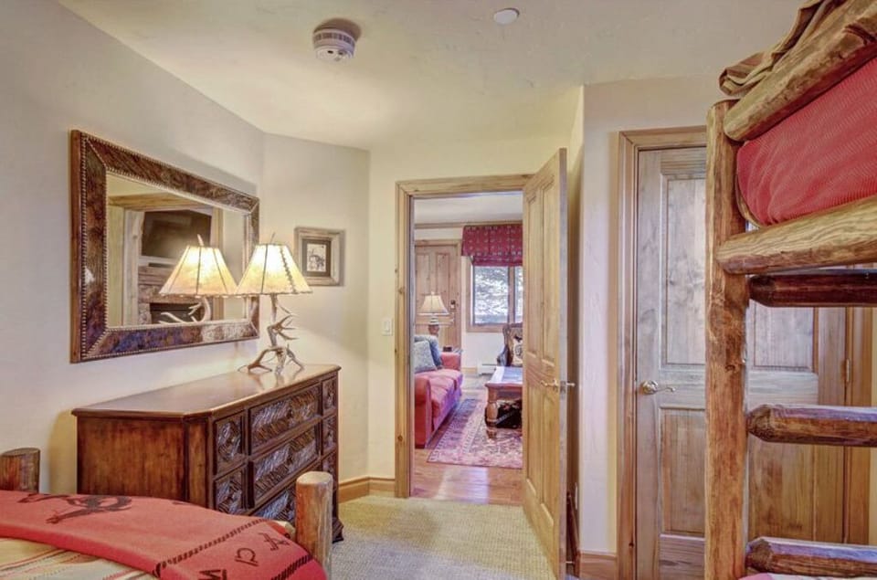 Welcoming entryway with warm wood accents and a rustic mountain charm.