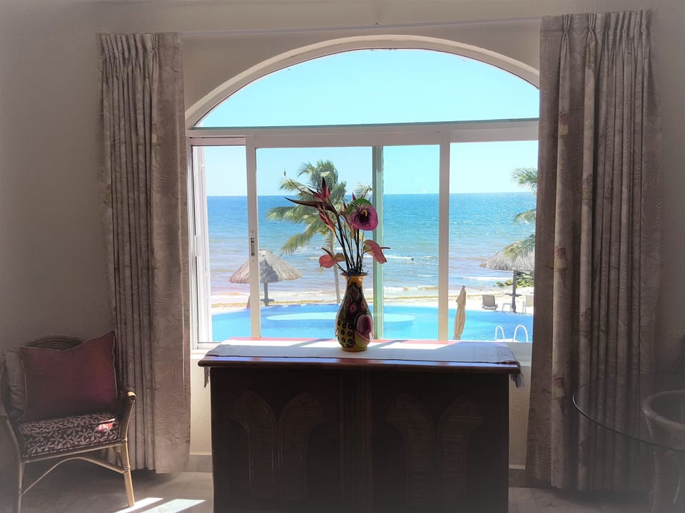 Master bedroom view of pool and ocean