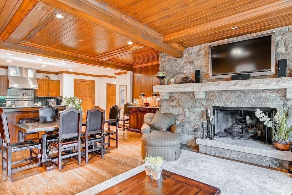 Warm up in front of the luxurious stone gas fireplace.