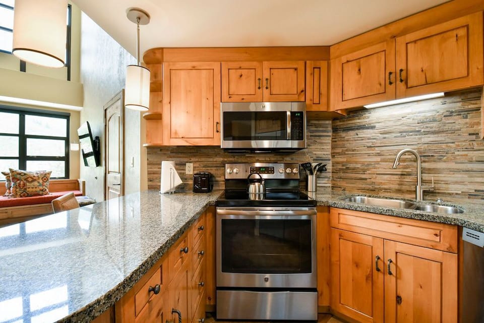 The fully-equipped kitchen features all the amenities you'd need to make a delicious meal.