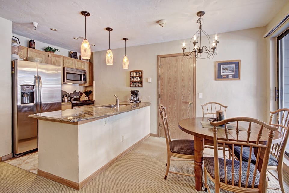 Take a seat at the dining room table and enjoy meals with the group.