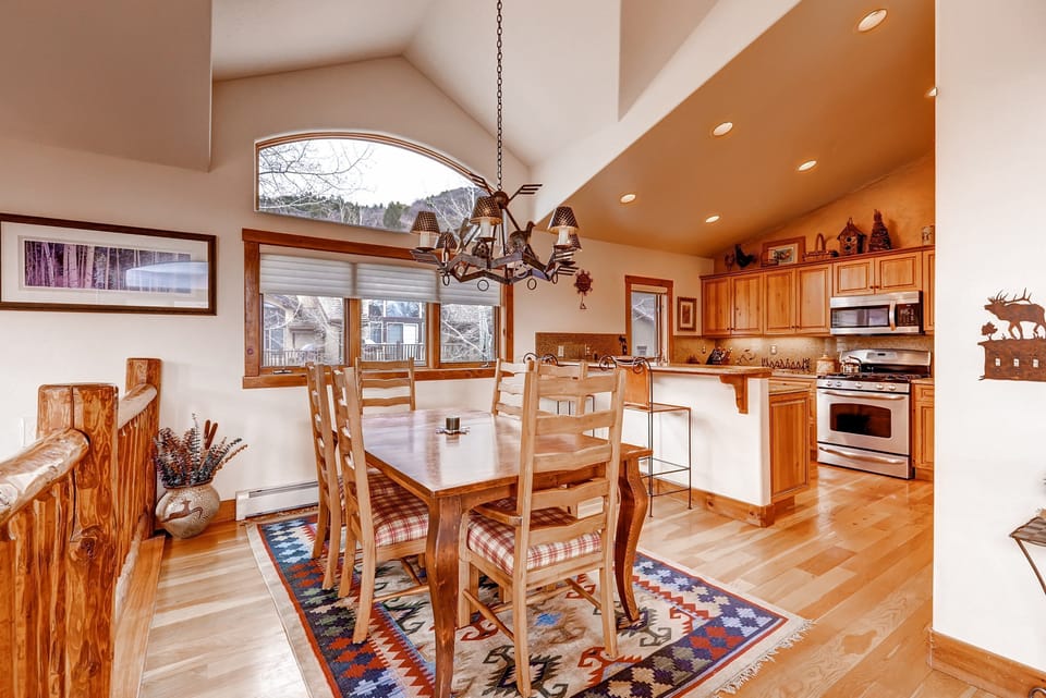 Share meals and laughs at the grand dining table.