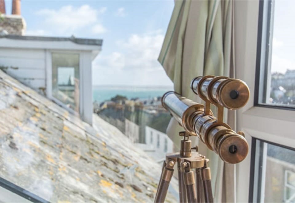 Original dormer windows with views across St Ives Bay and Godrevy lighthouse.