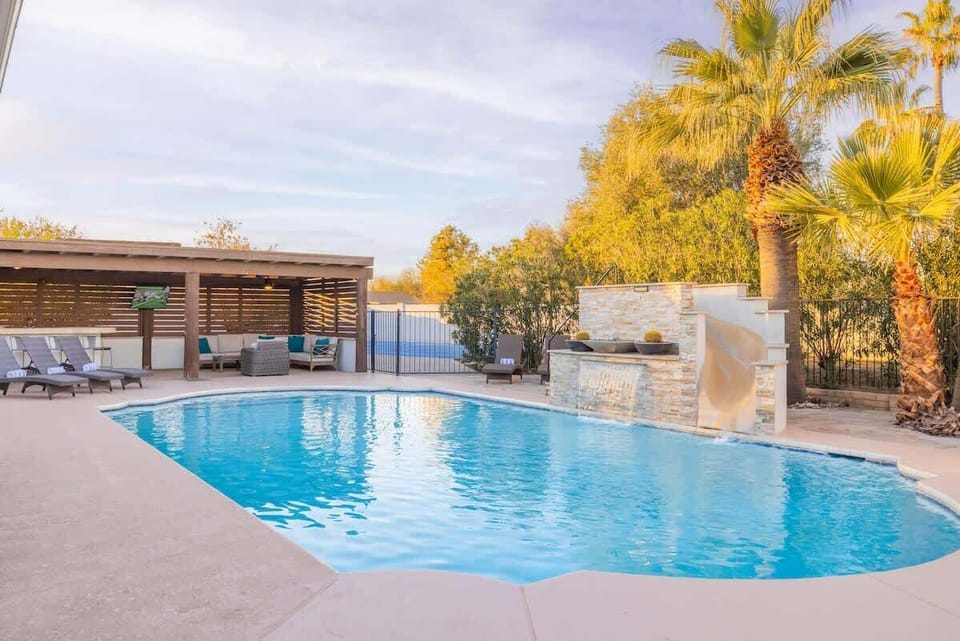 Outdoor fun: Pool, slide, TV, and space to gather your friends.