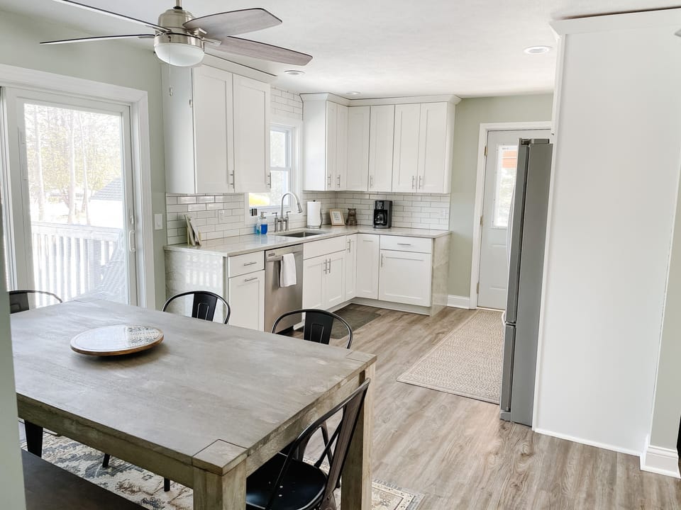 Kitchen with full dining table - 4 chairs and one dining bench