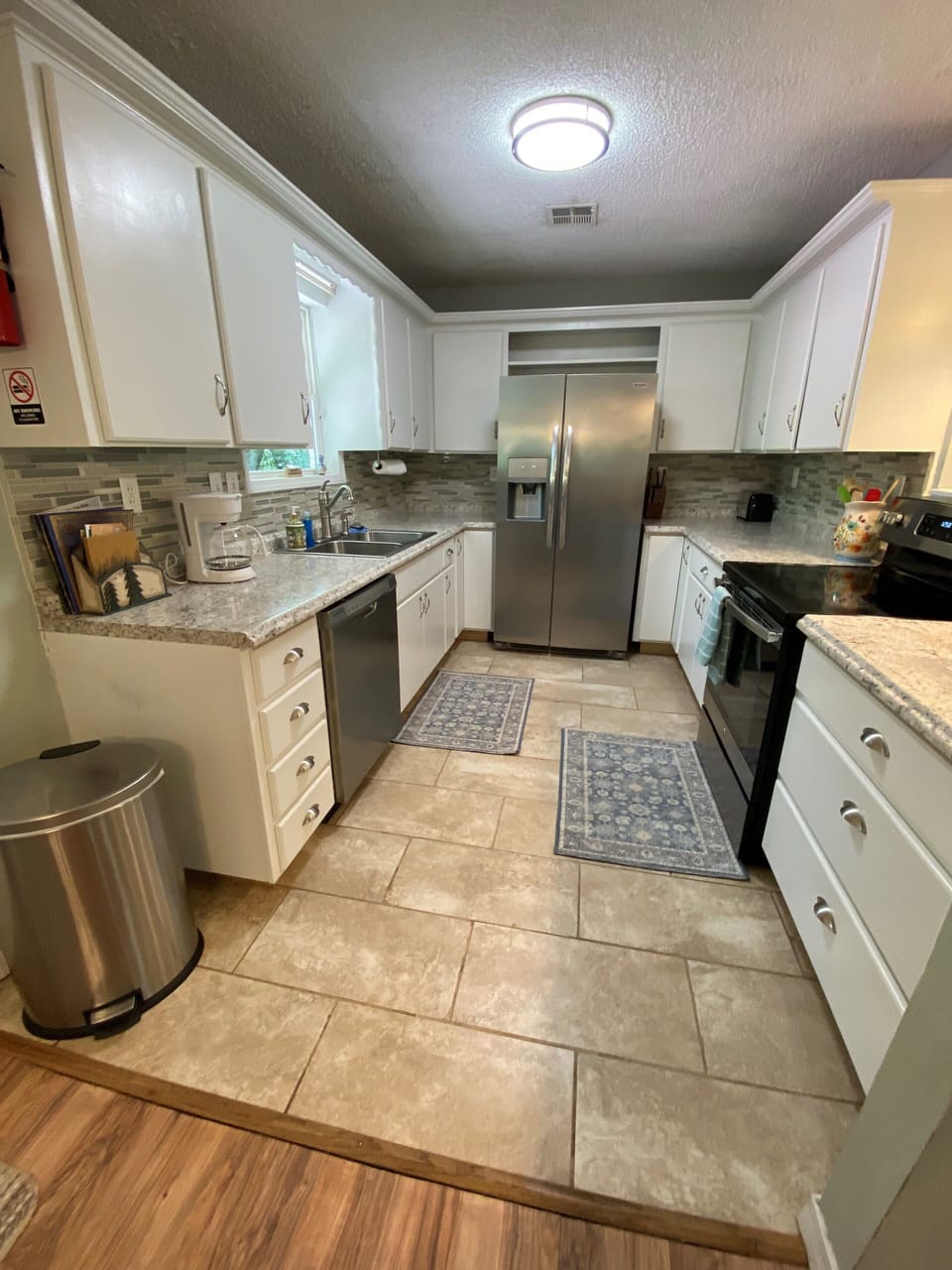 Fully stocked kitchen; coffee maker, dishwasher, cookware and spices.