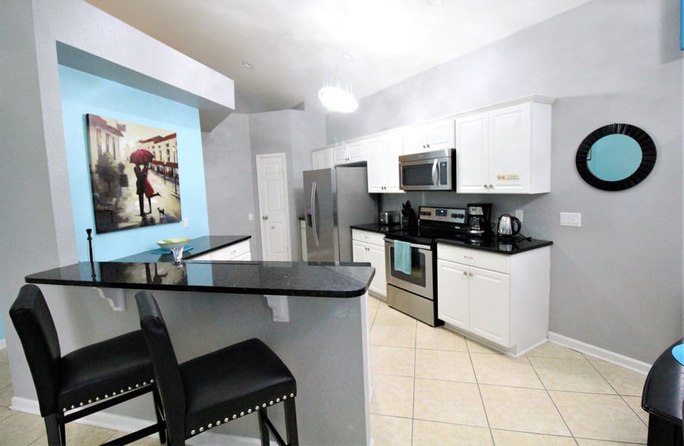 Fully stocked spacious Kitchen with Stainless Steel Appliances