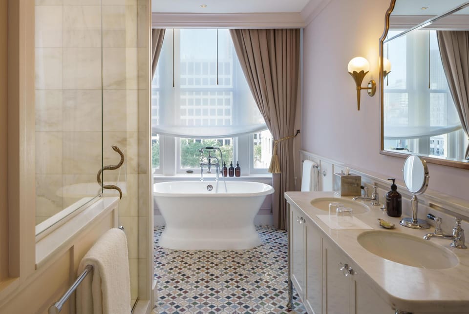 Separate tub and shower, deep soaking tub, designer toiletries