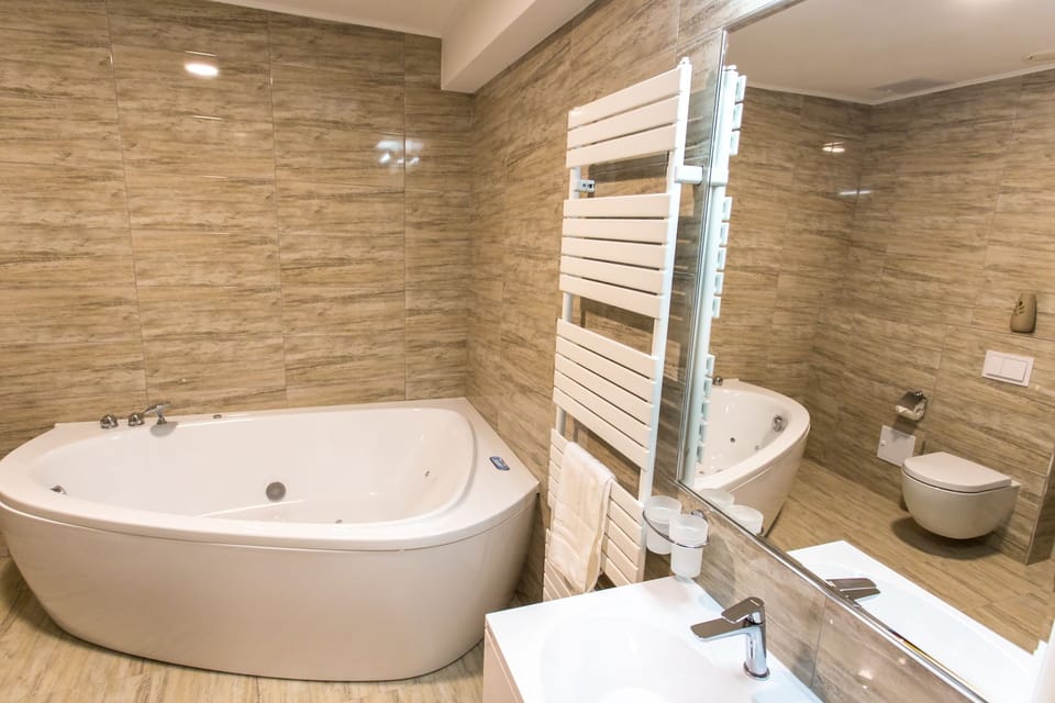 Panoramic Apartment, 1 Bedroom, Non Smoking, Terrace | Bathroom | Separate tub and shower, jetted tub, rainfall showerhead, hair dryer