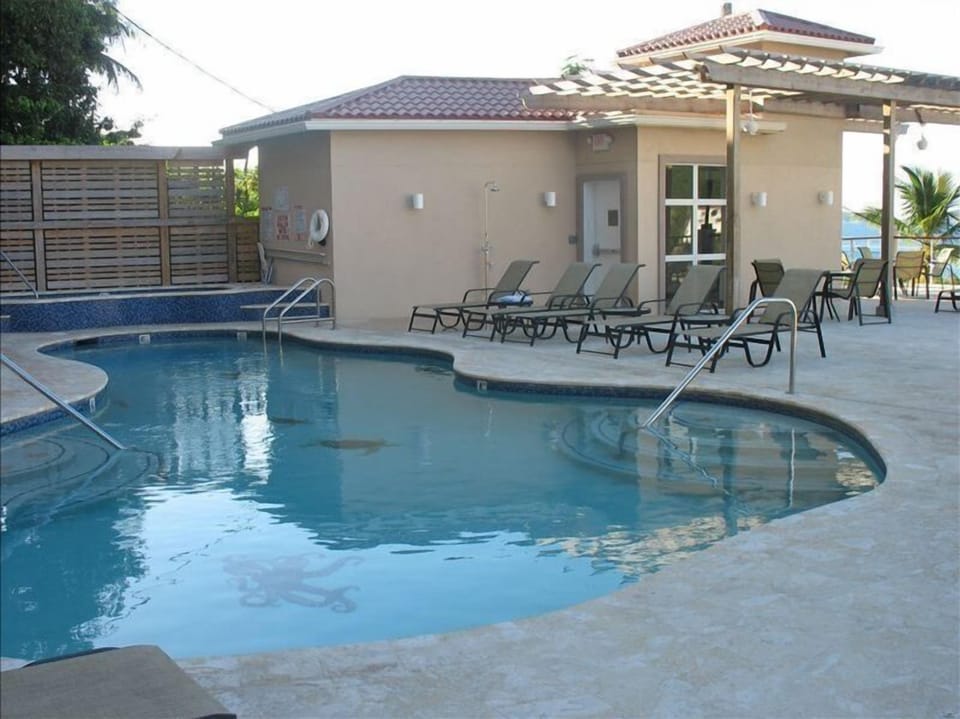 Grande Bay pool deck and hot tub area - overlooking the ocean.