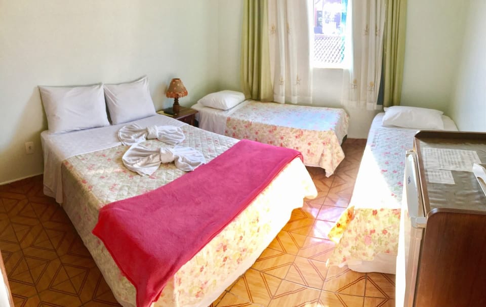 Quarto Standard com Ventilador | Minibar, blackout drapes, free WiFi
