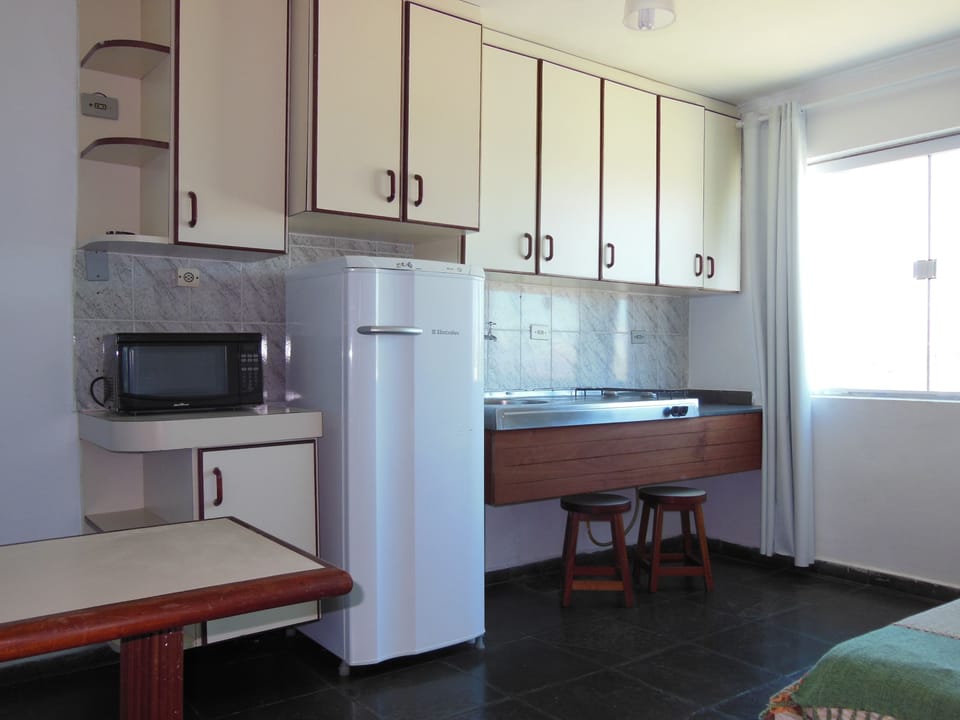 Apartment, Beachfront | Private kitchen | Fridge, stovetop, cookware/dishes/utensils