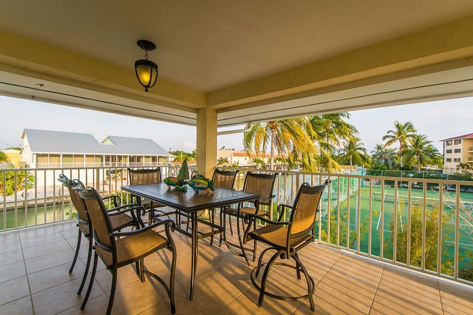 Outdoor dining on the patio with unforgettable sunset views.