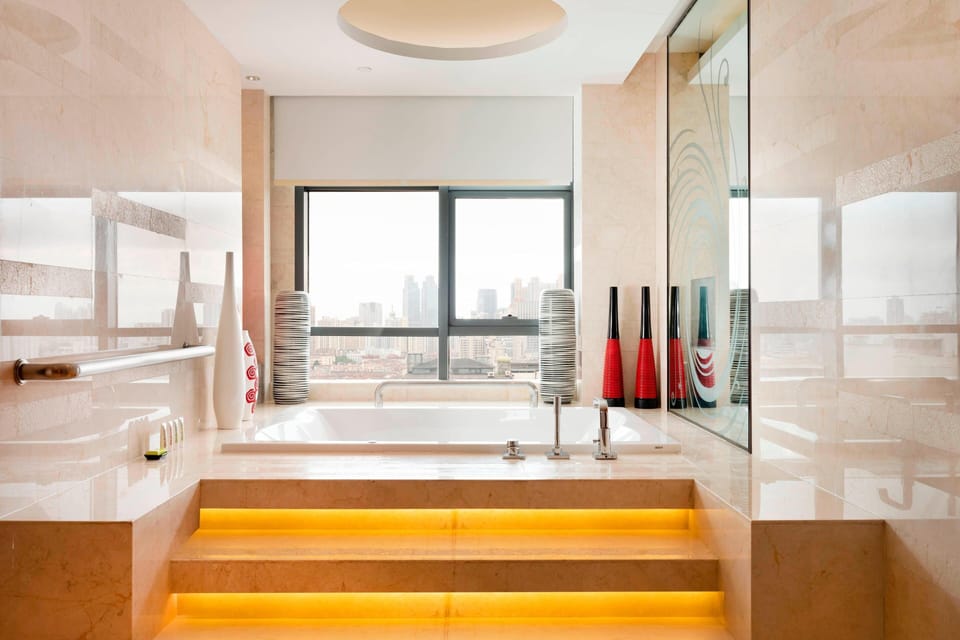 Separate tub and shower, jetted tub, free toiletries, hair dryer